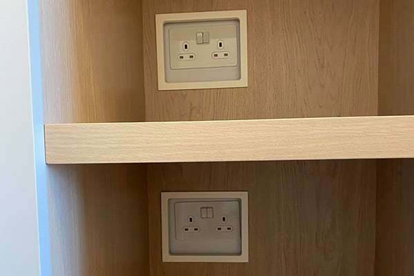 Joinery built to the exact width of an awkward recess